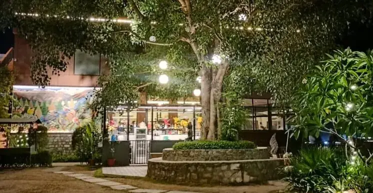A garden resort path lit at night